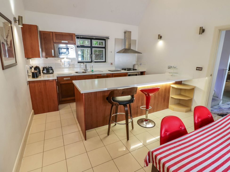 A kitchen with counter space and appliances at Tudor Lodge in Birmingham
