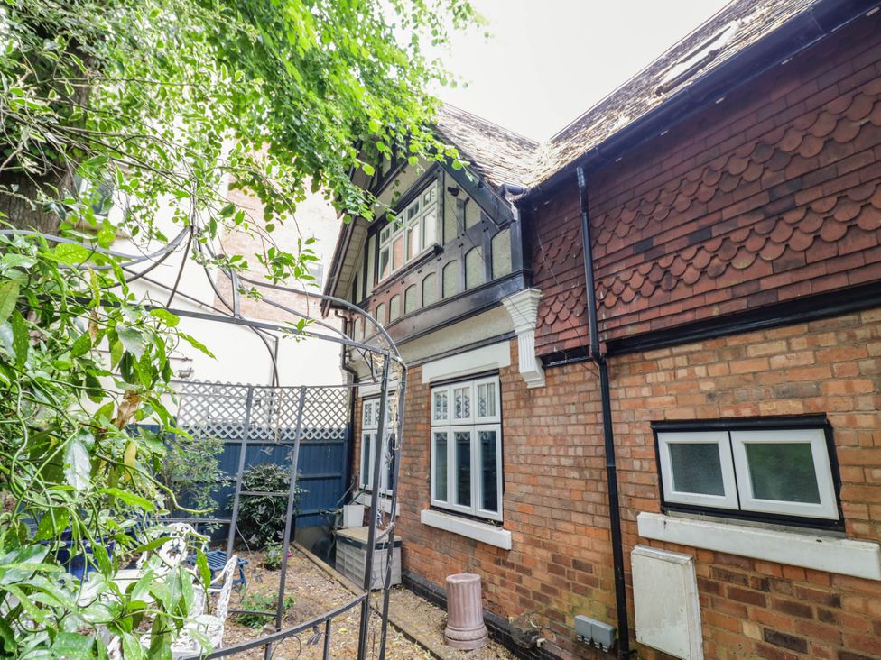 An exterior view of the house with garden at Tudor Lodge in Birmingham