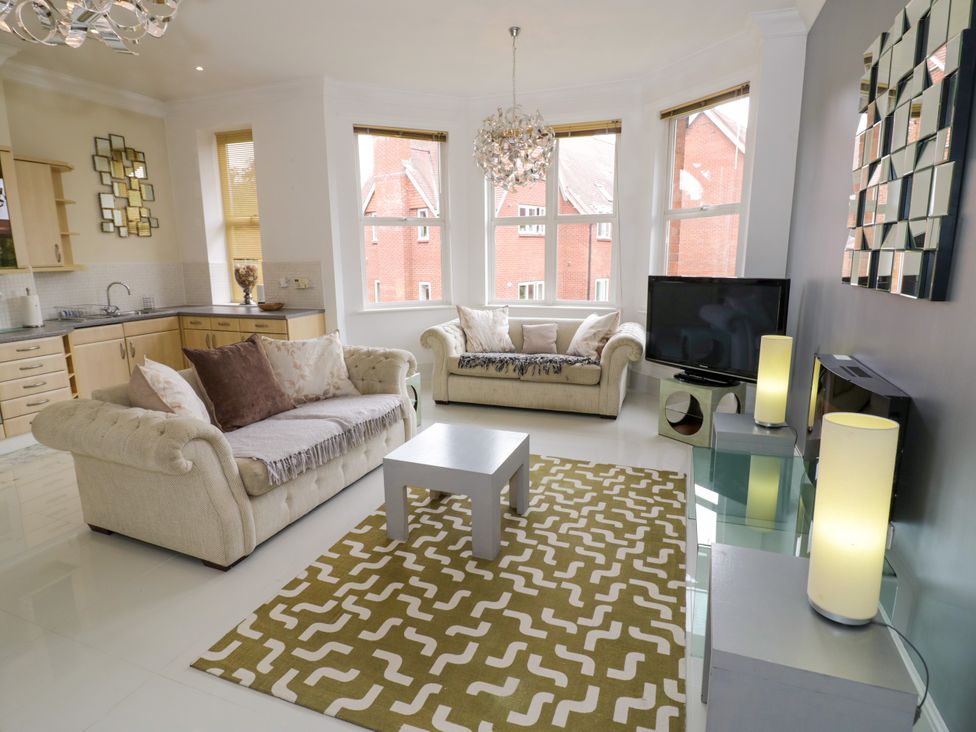 A living room with a sofa and coffee table at Manor House in Birmingham