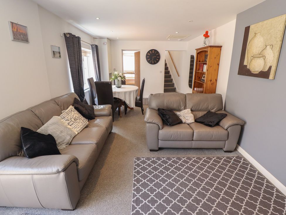 A living room with sofas and a dining table at Number 3 Old Boston Road in Coningsby
