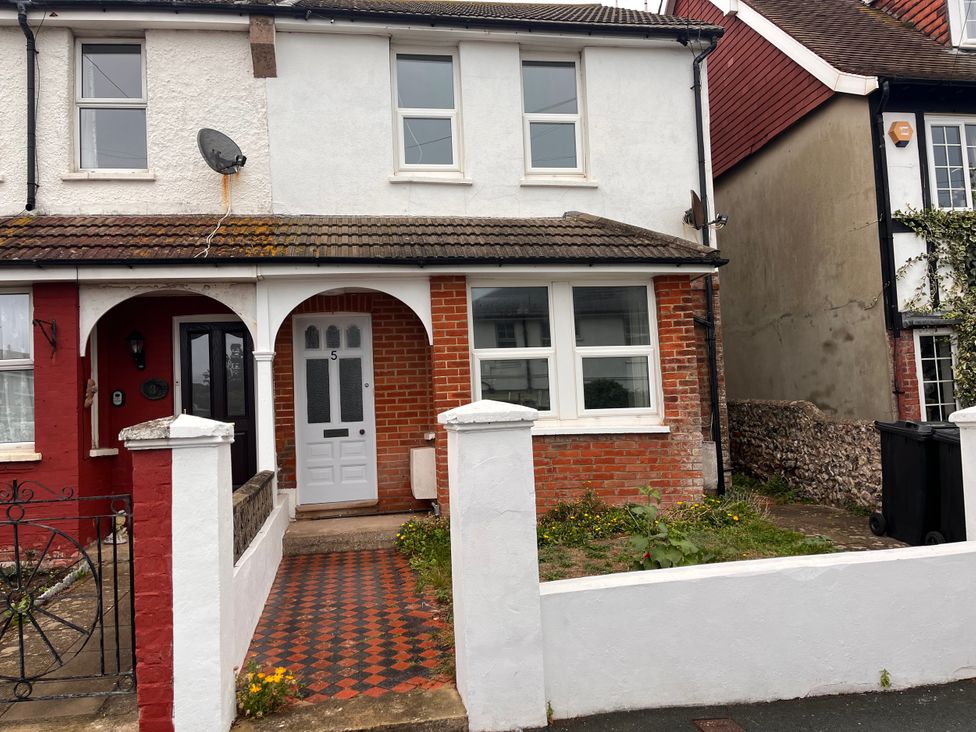 A house with a front door and garden at 5a Bramber Road in Seaford