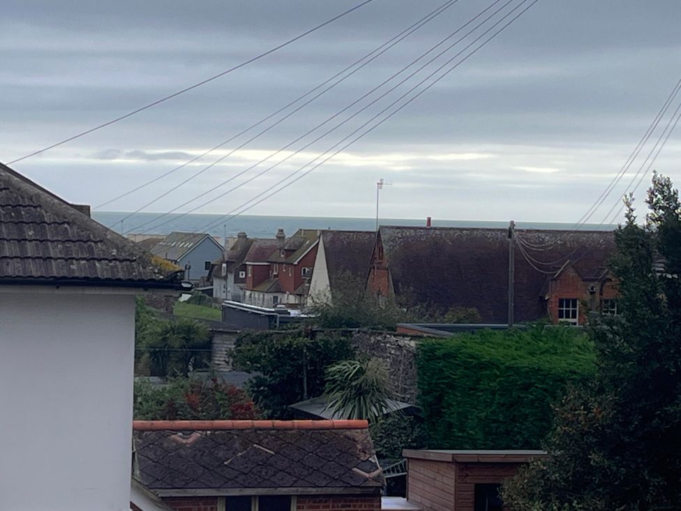 A view of houses and the sea at 5a Bramber Road Seaford