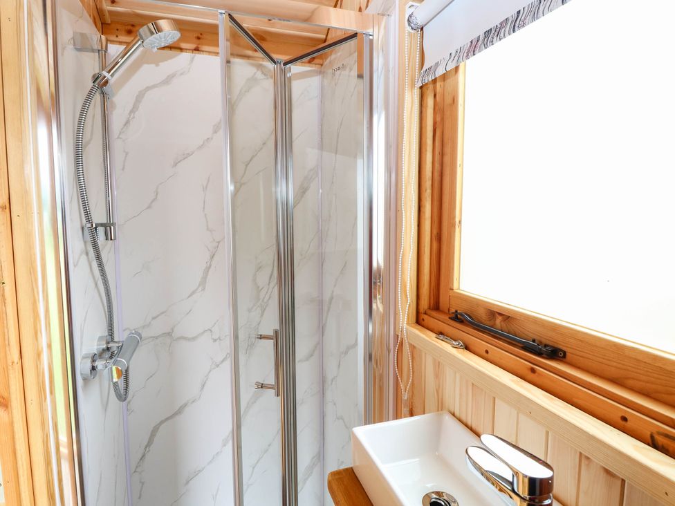 A bathroom with a shower and sink at Laurel in Welney near Littleport