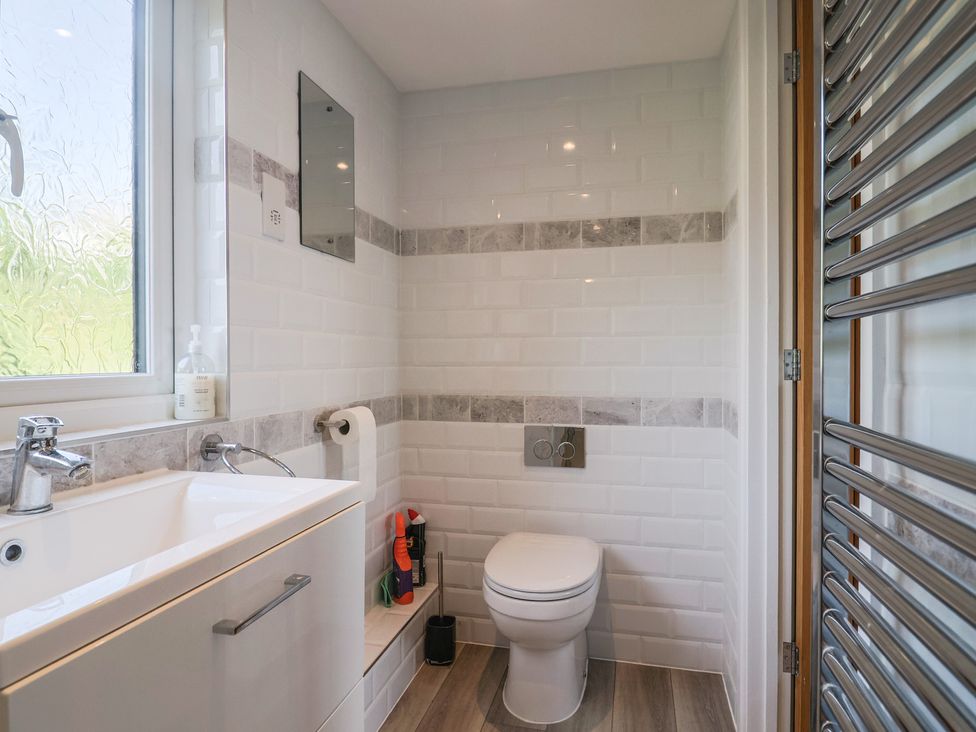 A bathroom with a sink and toilet at Seaview in Lyme Regis