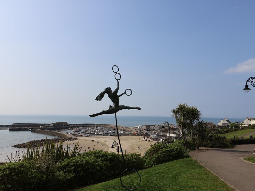 A sculpture overlooking the beach and ocean at Seaview in Lyme Regis