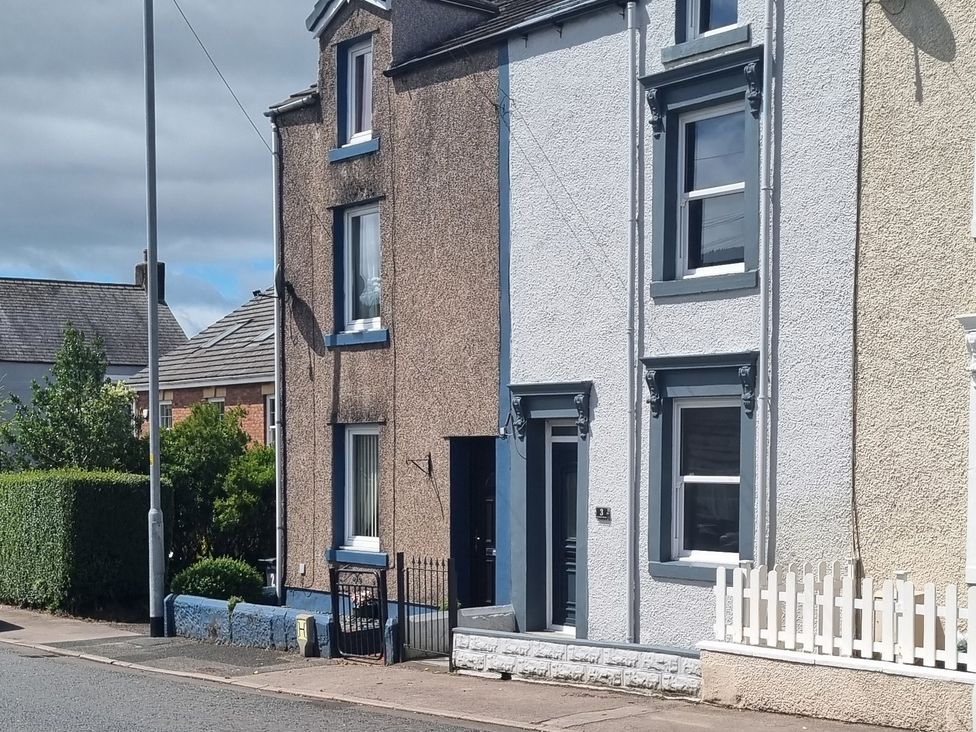 A building with a door and windows at 3 Greystone Terrace in Cleator Moor