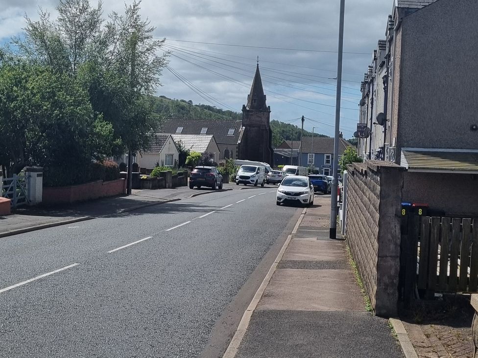 A street with houses and a church in Cleator Moor