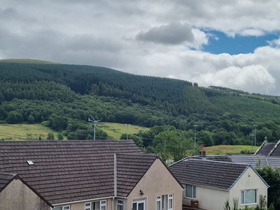 A view of houses and mountains at 3 Greystone Terrace in Cleator Moor