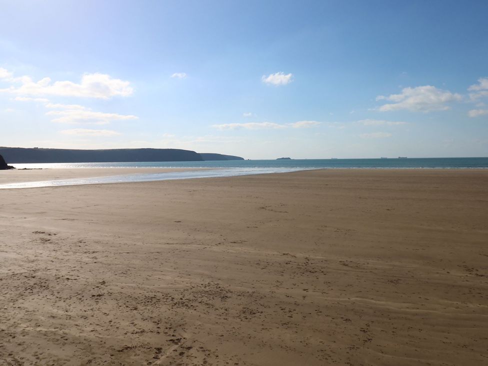 A beach with sand and ocean view at One Sand Banks in Haverfordwest