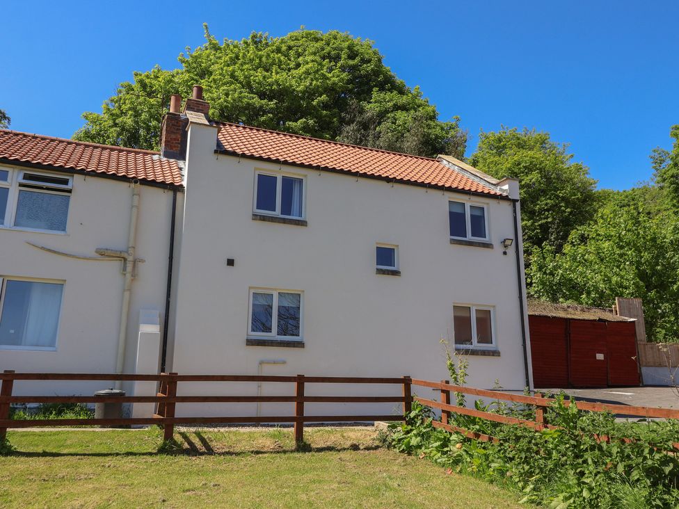 A house with a garden and trees at Sea View in Scarborough