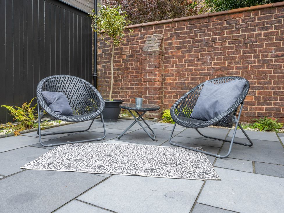 A seating area with two chairs and a table at Blackwood in Hornsea