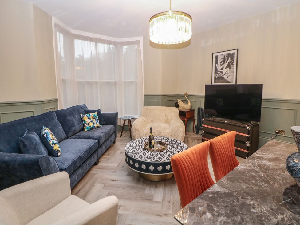 A living room with a sofa and a coffee table at The Chatsworth Suite Buxton