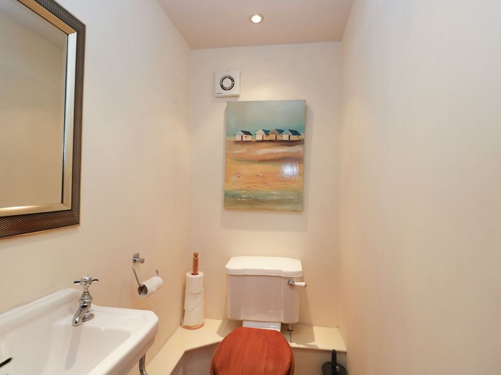 A bathroom with a sink and toilet at The Old Barn in Hereford