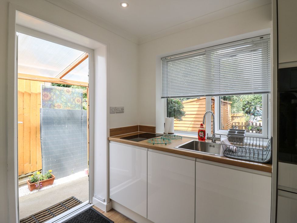 A kitchen with sink and countertop at Oakwood Annexe in Colchester