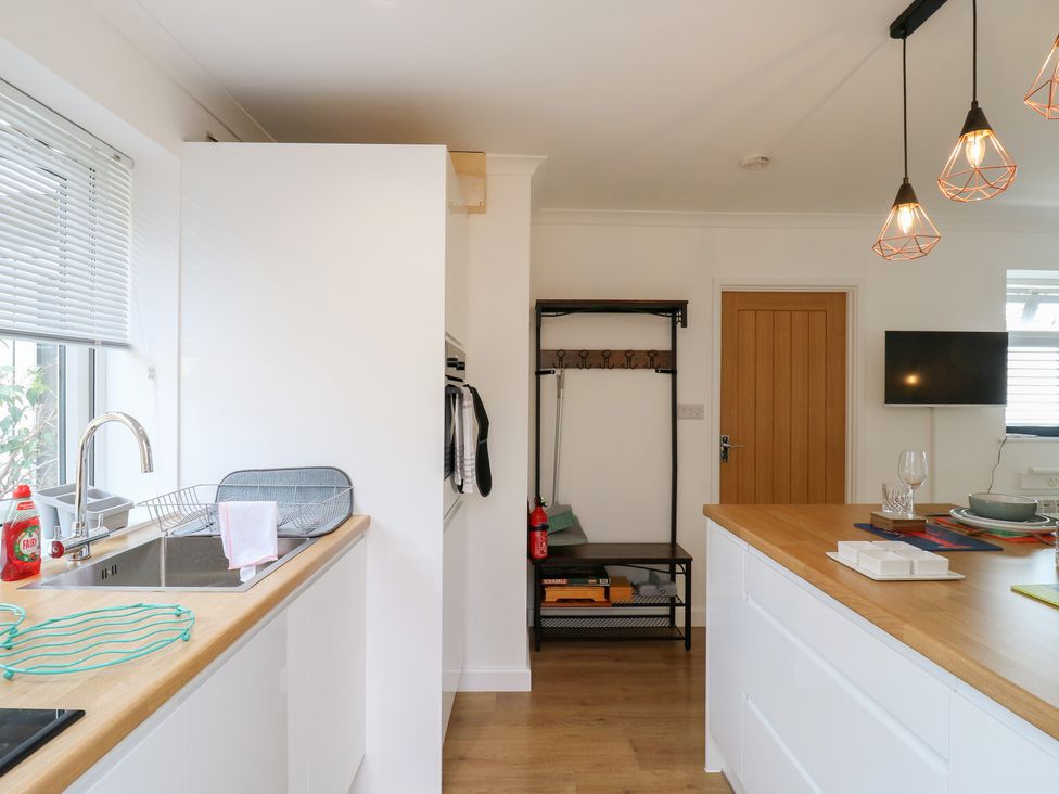 A kitchen with sink and countertop at Oakwood Annexe in Colchester