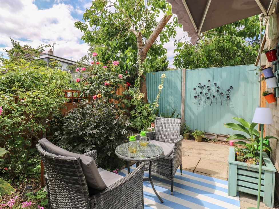 A garden with seating and plants at Oakwood Annexe Colchester