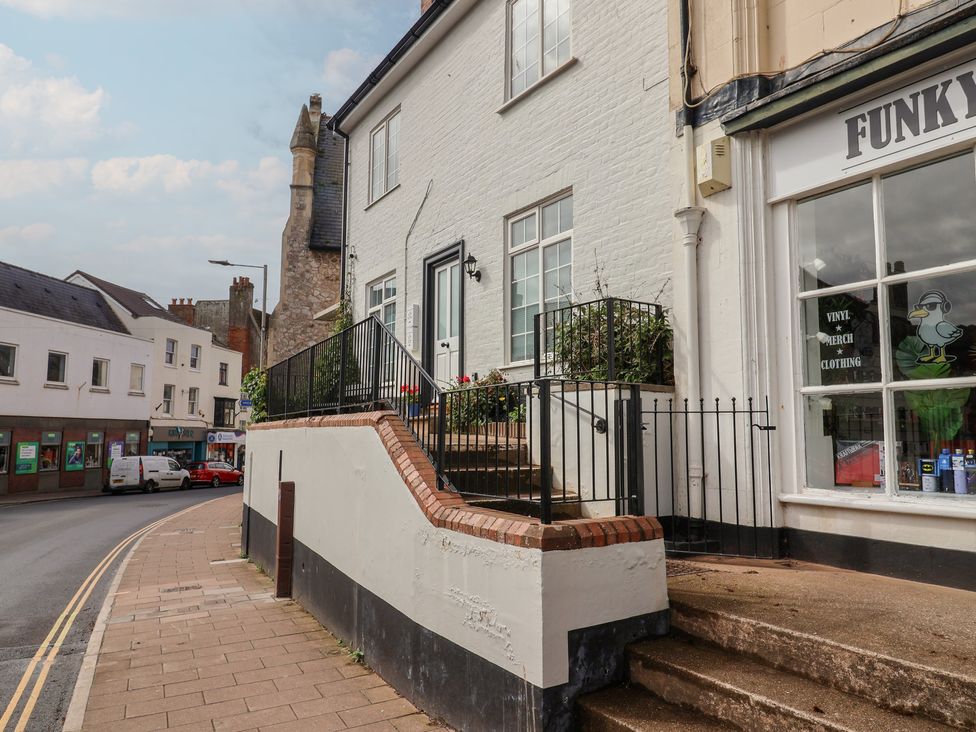 An outdoor view of a building with entrance steps at Flat 1 Harley House Sidmouth