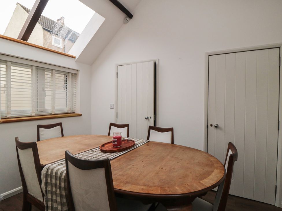 A dining room with a table and chairs at The Joinery in Scarborough