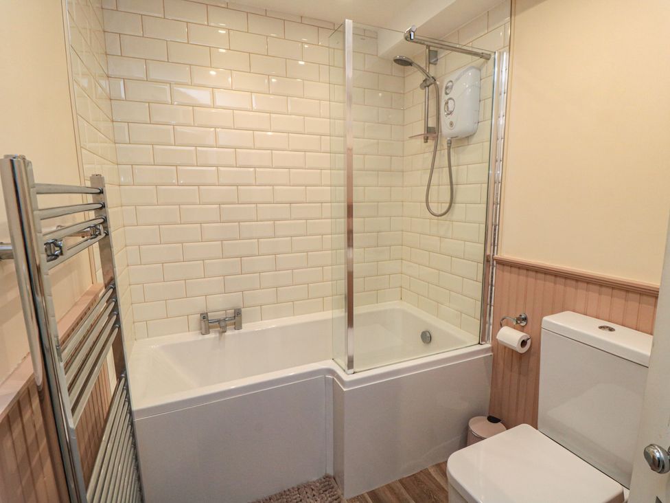 A bathroom with a bathtub and shower at The Joinery in Scarborough
