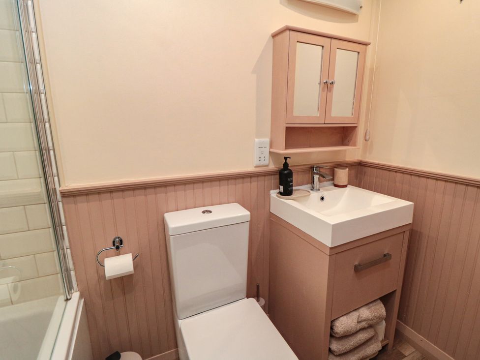 A bathroom with a sink and a toilet at The Joinery in Scarborough