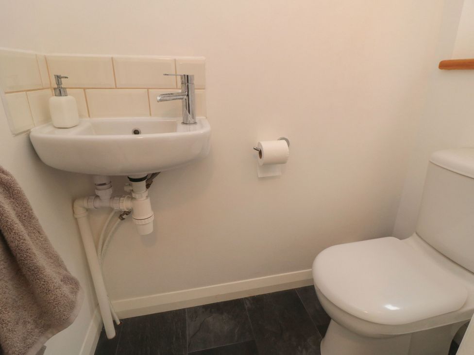 A bathroom with a sink and toilet at The Joinery in Scarborough