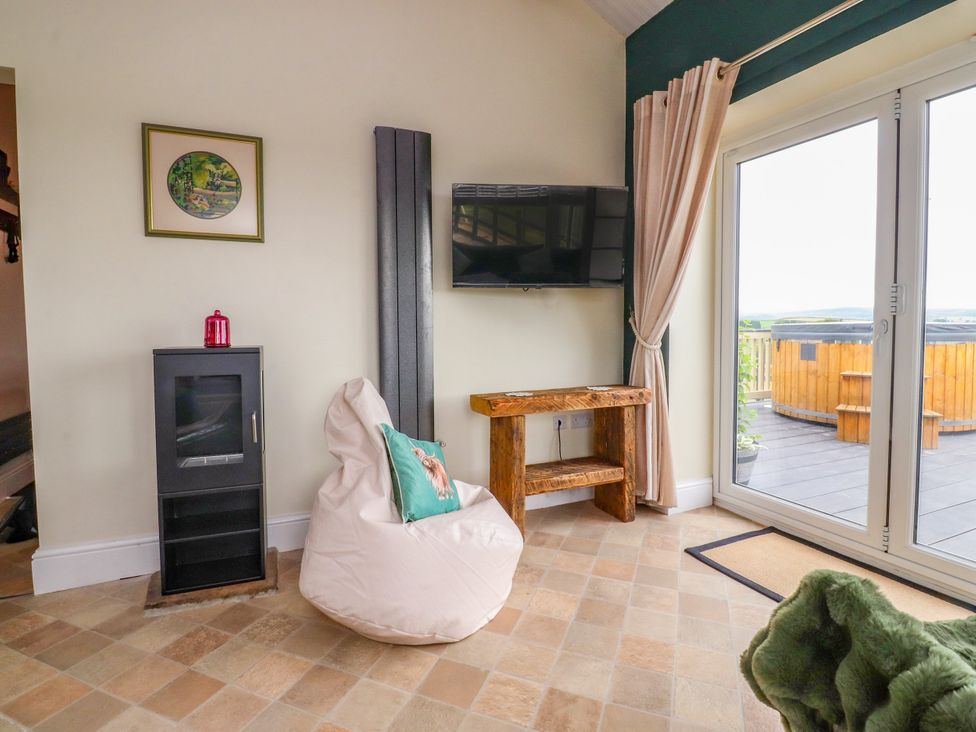A snug with a television and bean bag at The View in Ilkley
