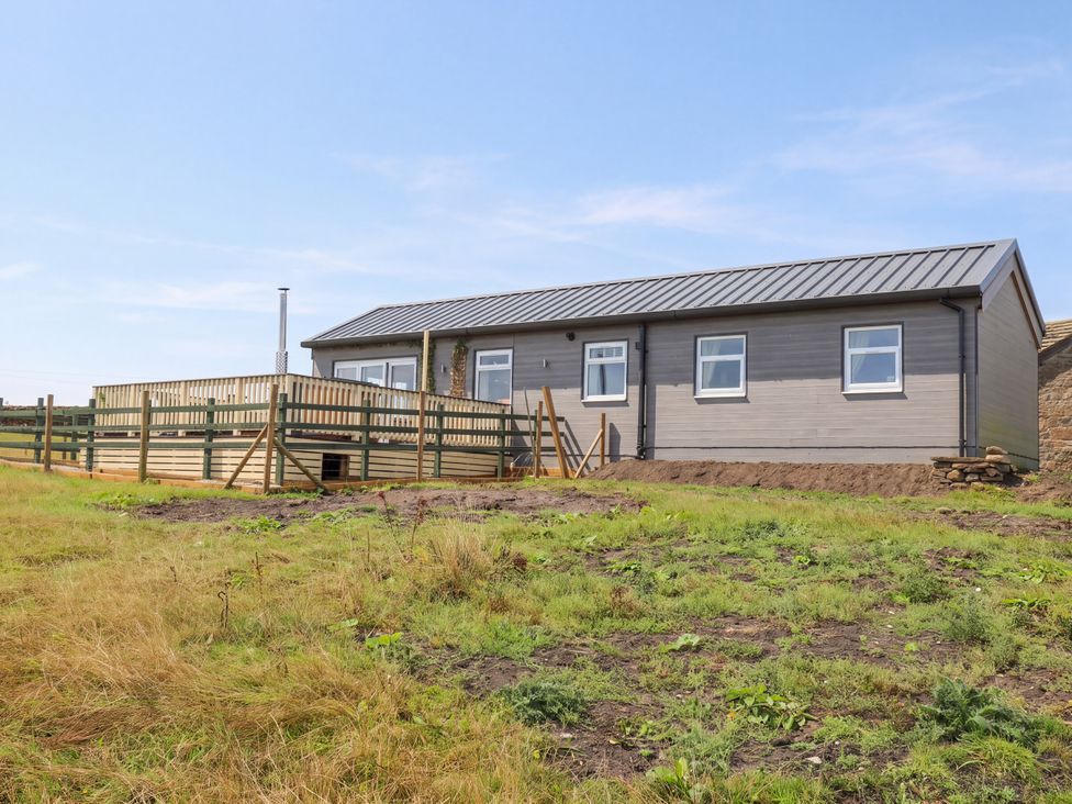 A house with a fence and deck at The View near Addingham