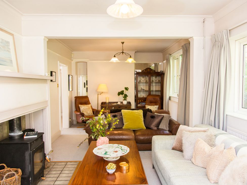 A living room with a sofa, coffee table and armchairs at Whitebeams, Pett Bottom near Stelling Minnis