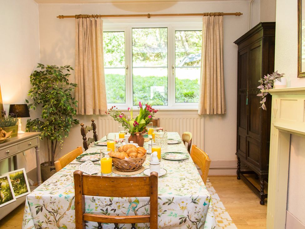 A dining room with a table set for breakfast at Whitebeams in Pett Bottom near Stelling Minnis
