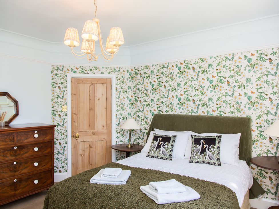 A bedroom with a bed and dresser at Whitebeams, Pett Bottom near Stelling Minnis