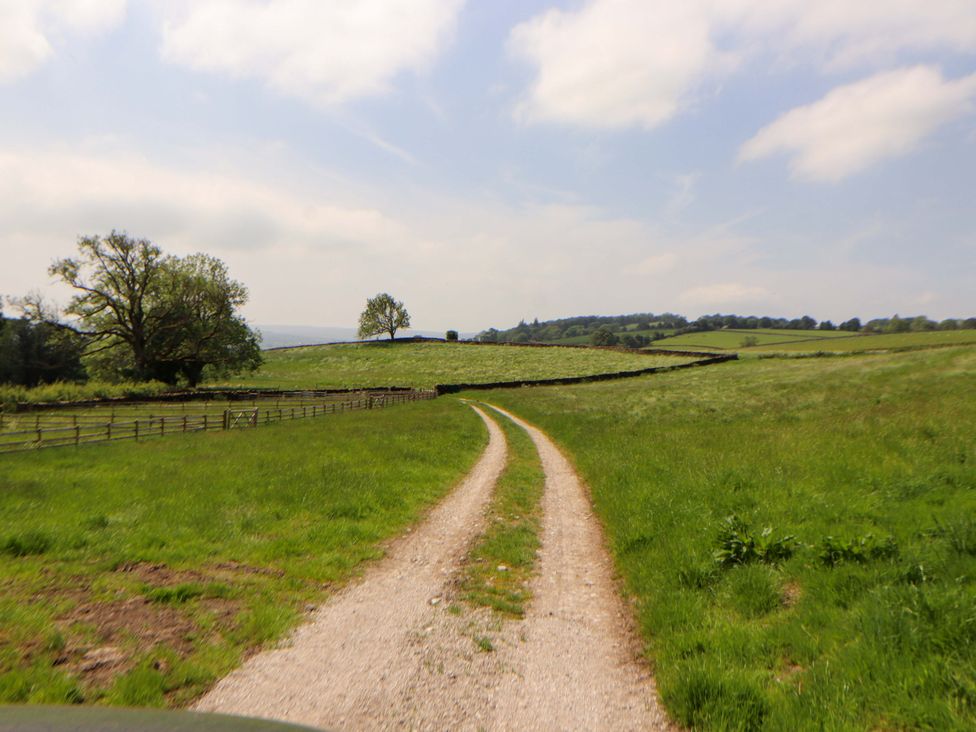 A gravel path leading through fields at Dam House Barn Lancaster