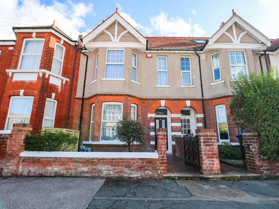 A house with a pathway and bushes at Fernleigh in Margate