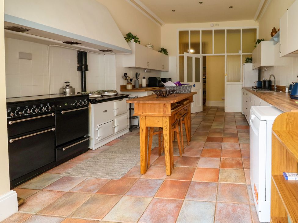 A kitchen with an oven and stove with a countertop at Parkfields House Stoke-on-Trent