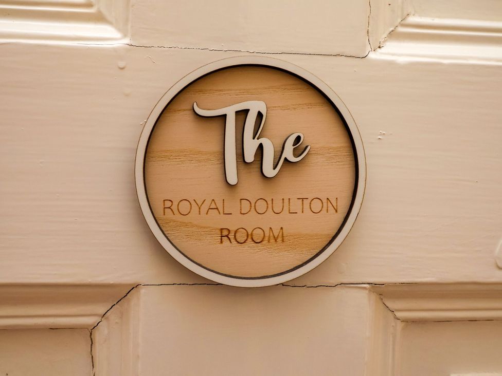 The Royal Doulton Room sign on a door at Parkfields House in Stoke-on-Trent