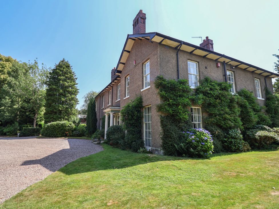A house with windows and greenery at Parkfields House Tittensor near Barlaston