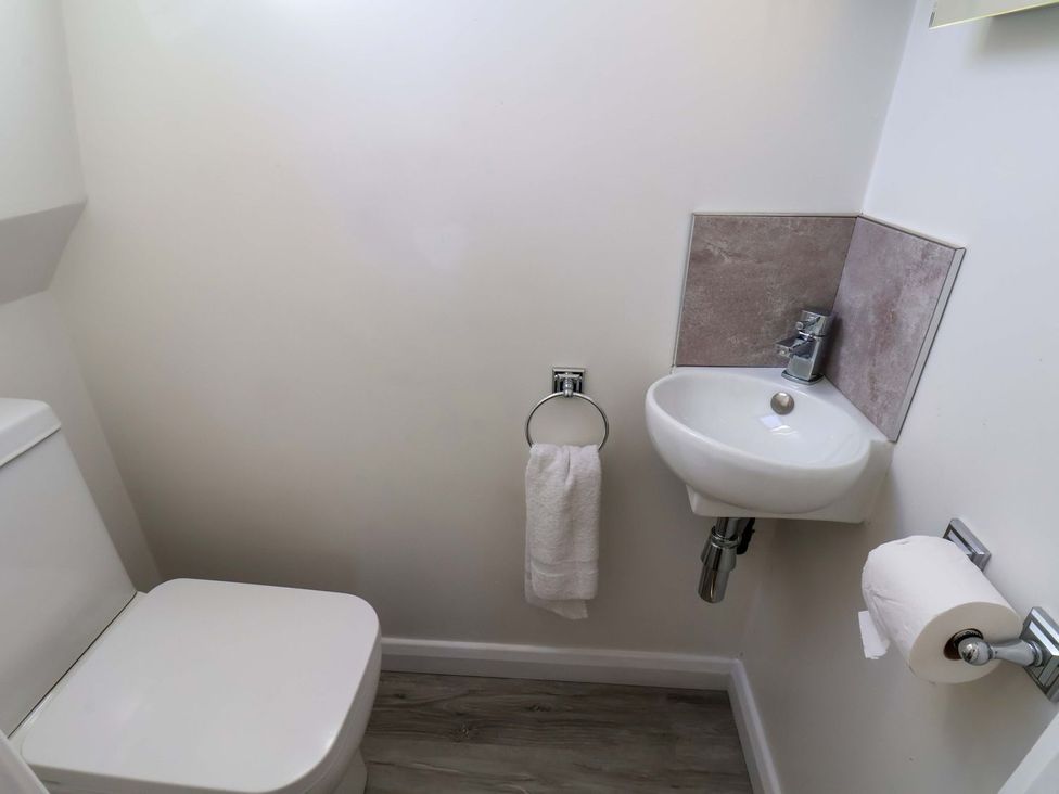 A bathroom with a sink and toilet at Beachcrest in Whitby