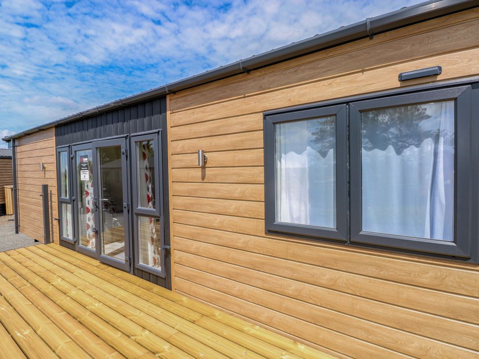 An exterior view of a building with a door and windows at Sandpiper in Narberth