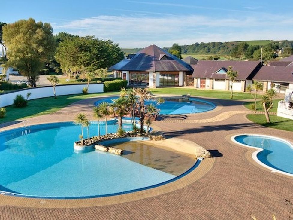 An outdoor area with multiple swimming pools at O7, Abersoch