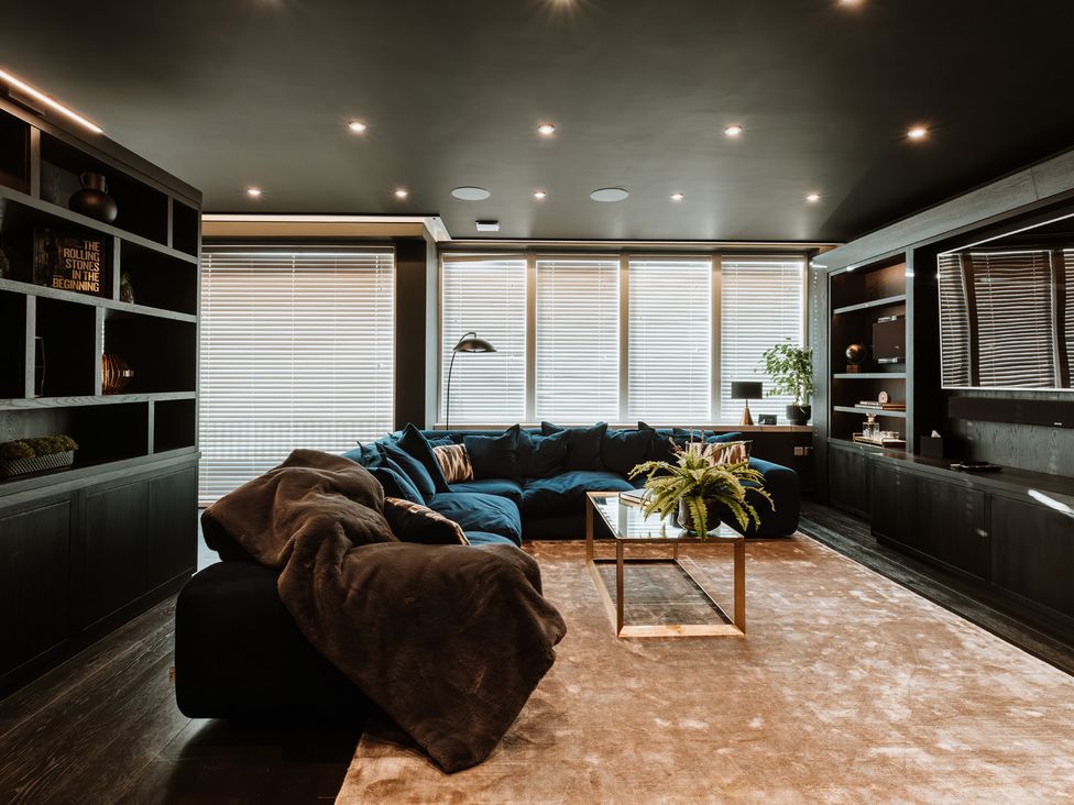 A living room with a sofa and coffee table at The Penthouse in Shrewsbury
