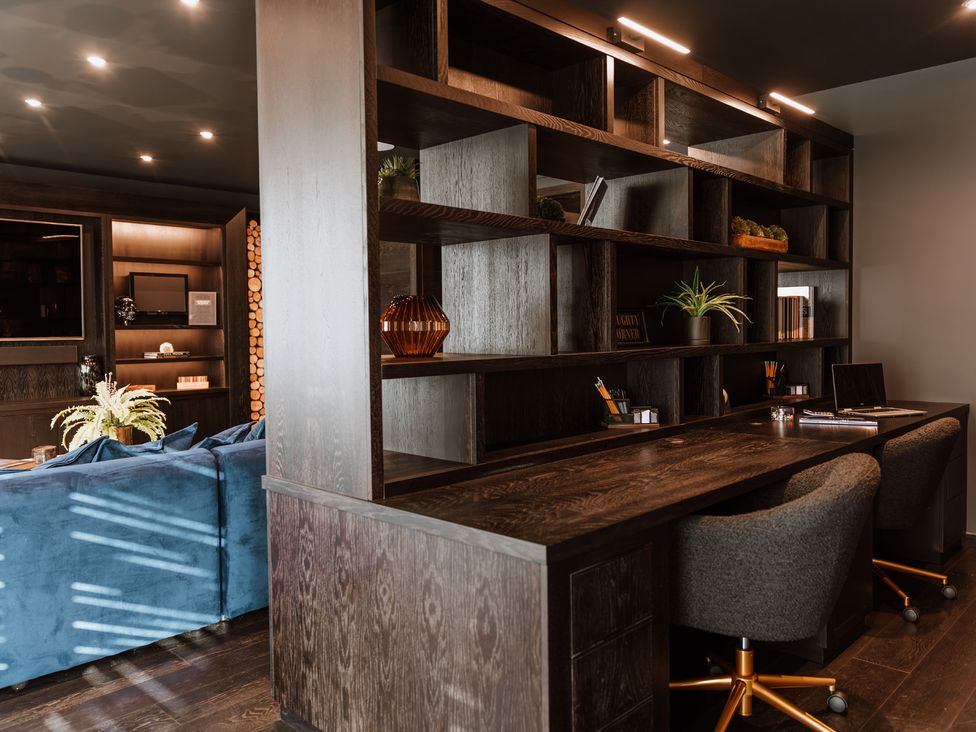 An office with a desk and chairs at The Penthouse in Shrewsbury
