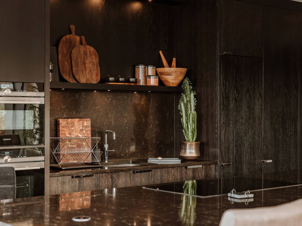 A kitchen with wooden boards and a cactus at The Penthouse in Shrewsbury