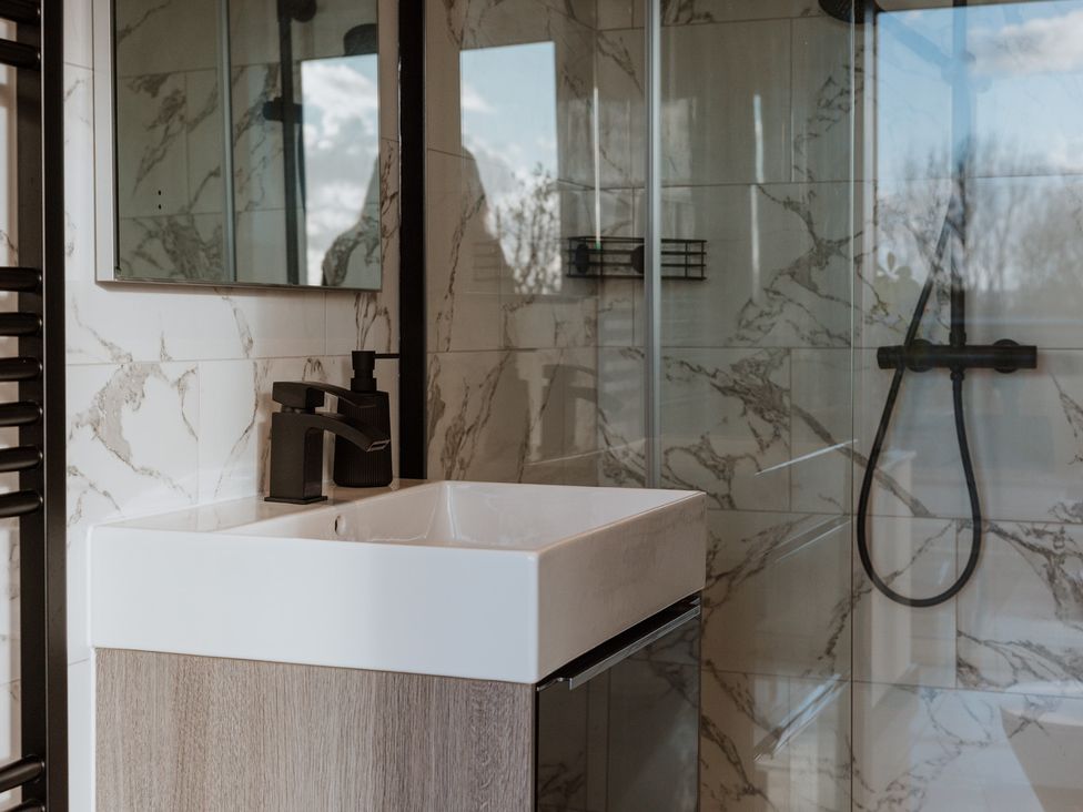 A bathroom with a sink and shower at The Penthouse in Shrewsbury