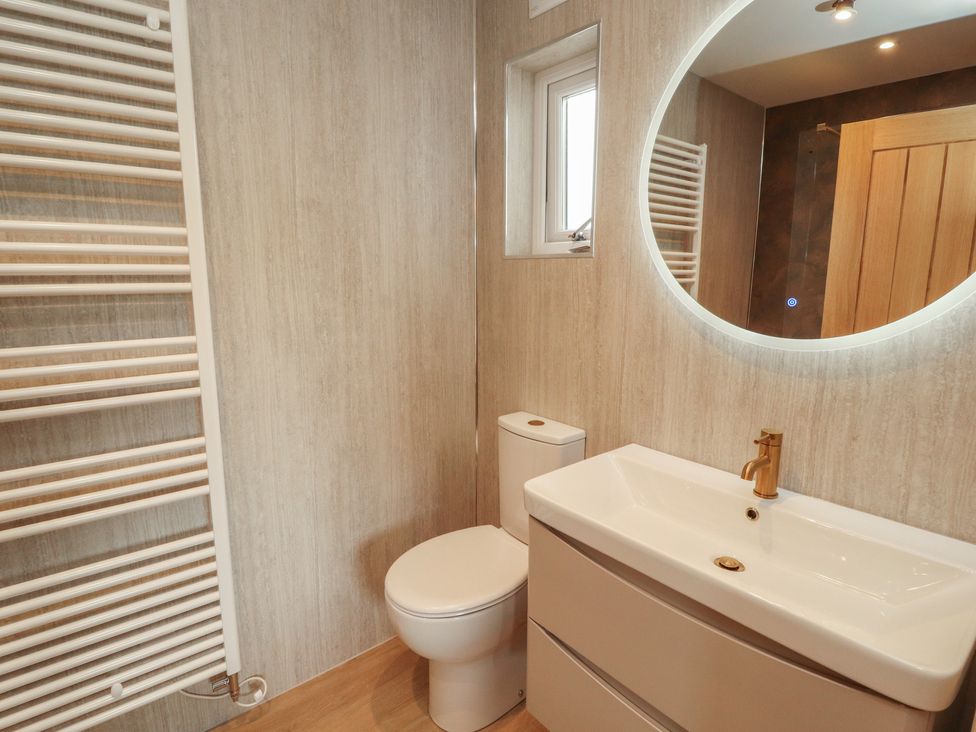A bathroom with a sink and toilet at Beckdale Settle