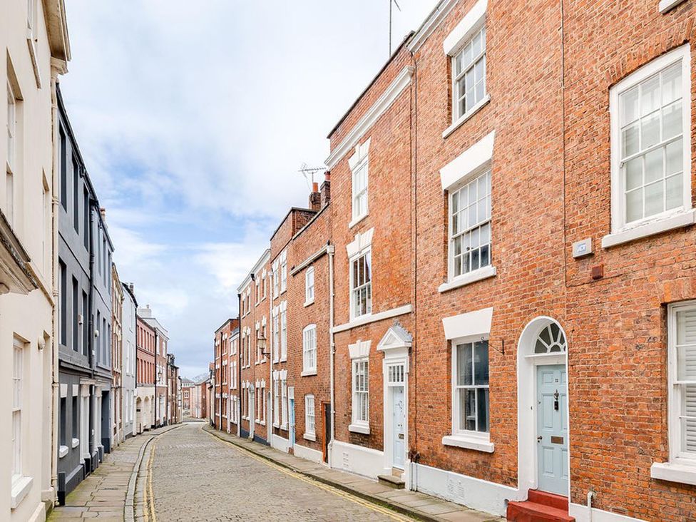 A street view with brick buildings and a cobblestone street at Luxury Georgian Townhouse / sleeps 10 / parking