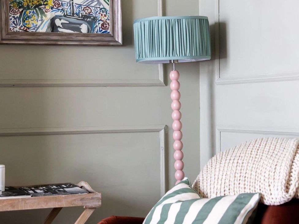 A living room with a table lamp and a painting at Luxury Georgian Townhouse / sleeps 10 / parking