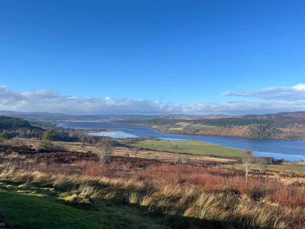 A view of a river and landscape at Migdale Heights - Luxury Cabins in The Highlands