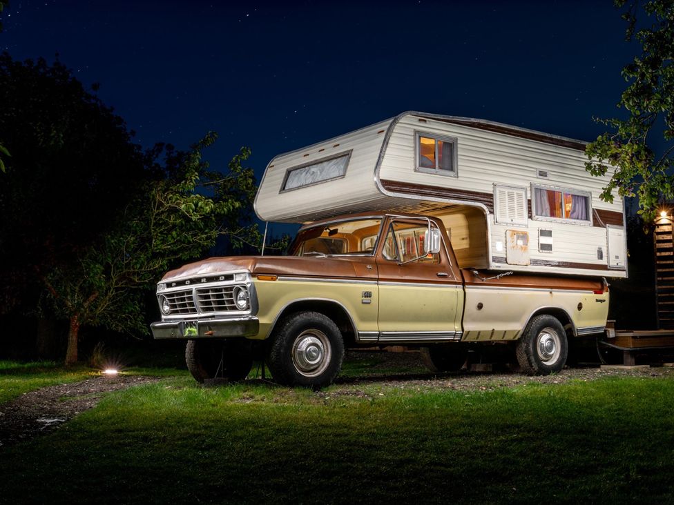 A truck with a camper on top at 1 Bed Vehicle Luxury Camper -Hot Tub, Pets - Willy, Mill Lane Farmhouse near Burgh Le Marsh
