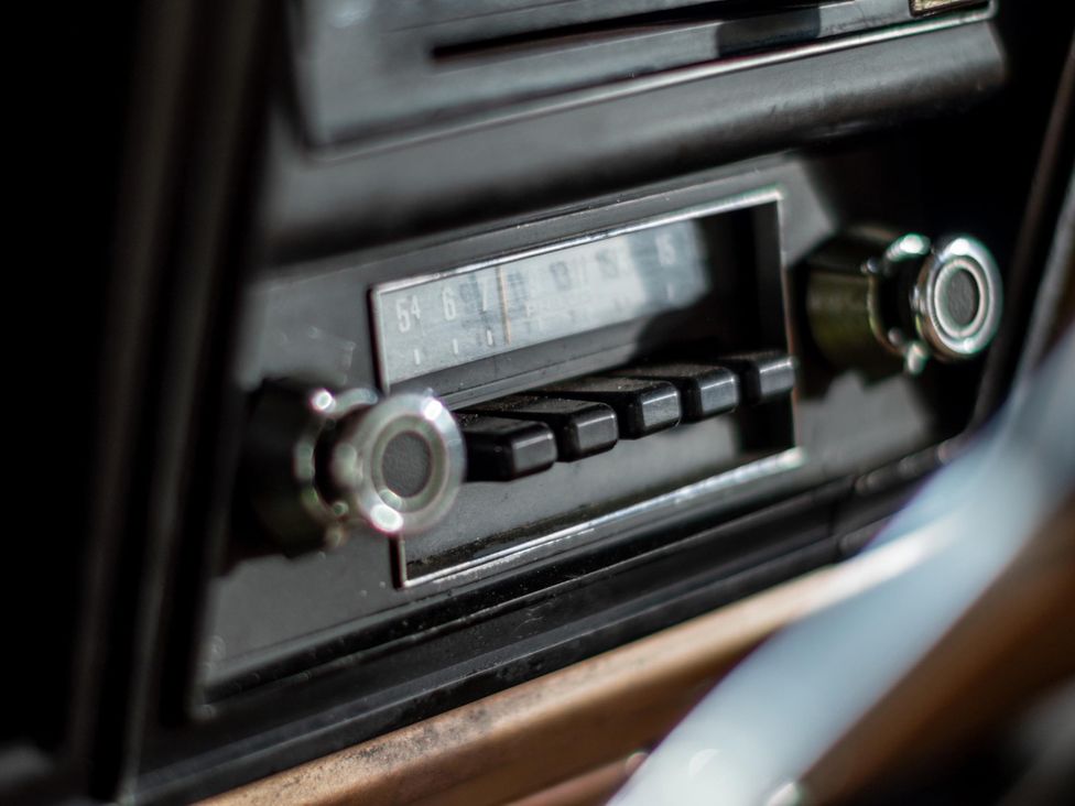 A vehicle interior with a radio control panel at 1 Bed Vehicle Luxury Camper -Hot Tub, Pets - Willy, Mill Lane Farmhouse near Burgh Le Marsh