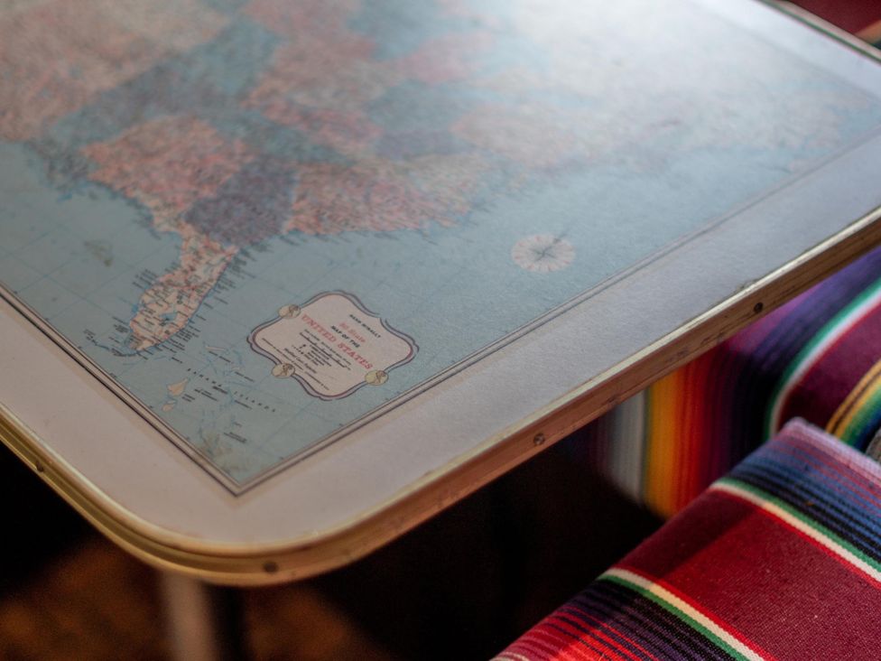 A table with a map of the United States at 1 Bed Vehicle Luxury Camper -Hot Tub, Pets - Willy, Mill Lane Farmhouse near Burgh Le Marsh
