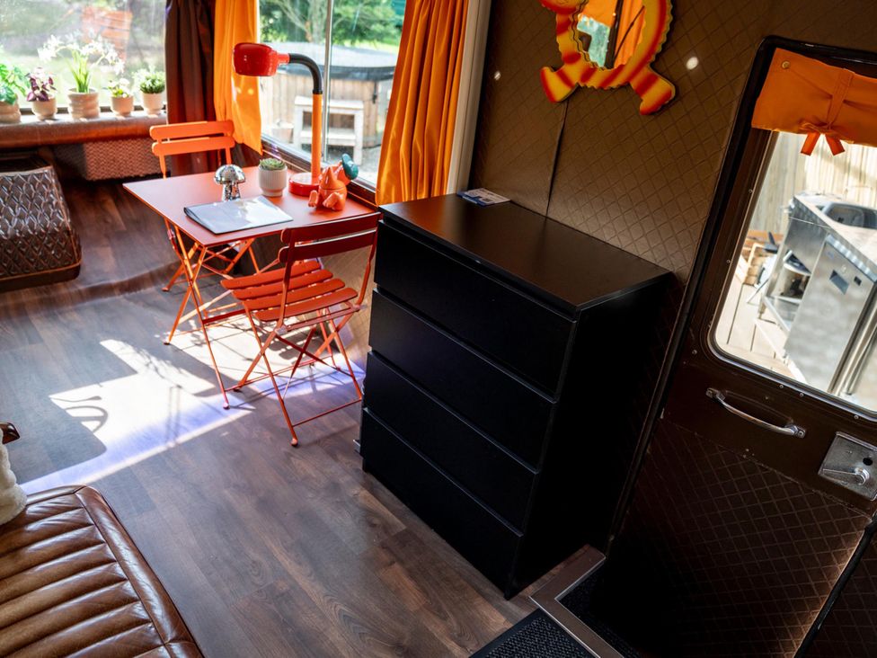 A workspace with a desk and chair at Sleeps 2 -Pets Welcome -Private Hot Tub -Alabama